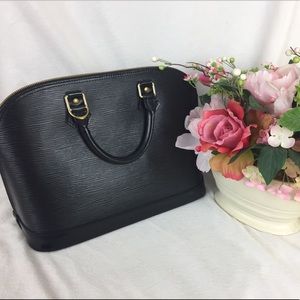 Authentic, stunning Louis Vuitton Black Epi Alma